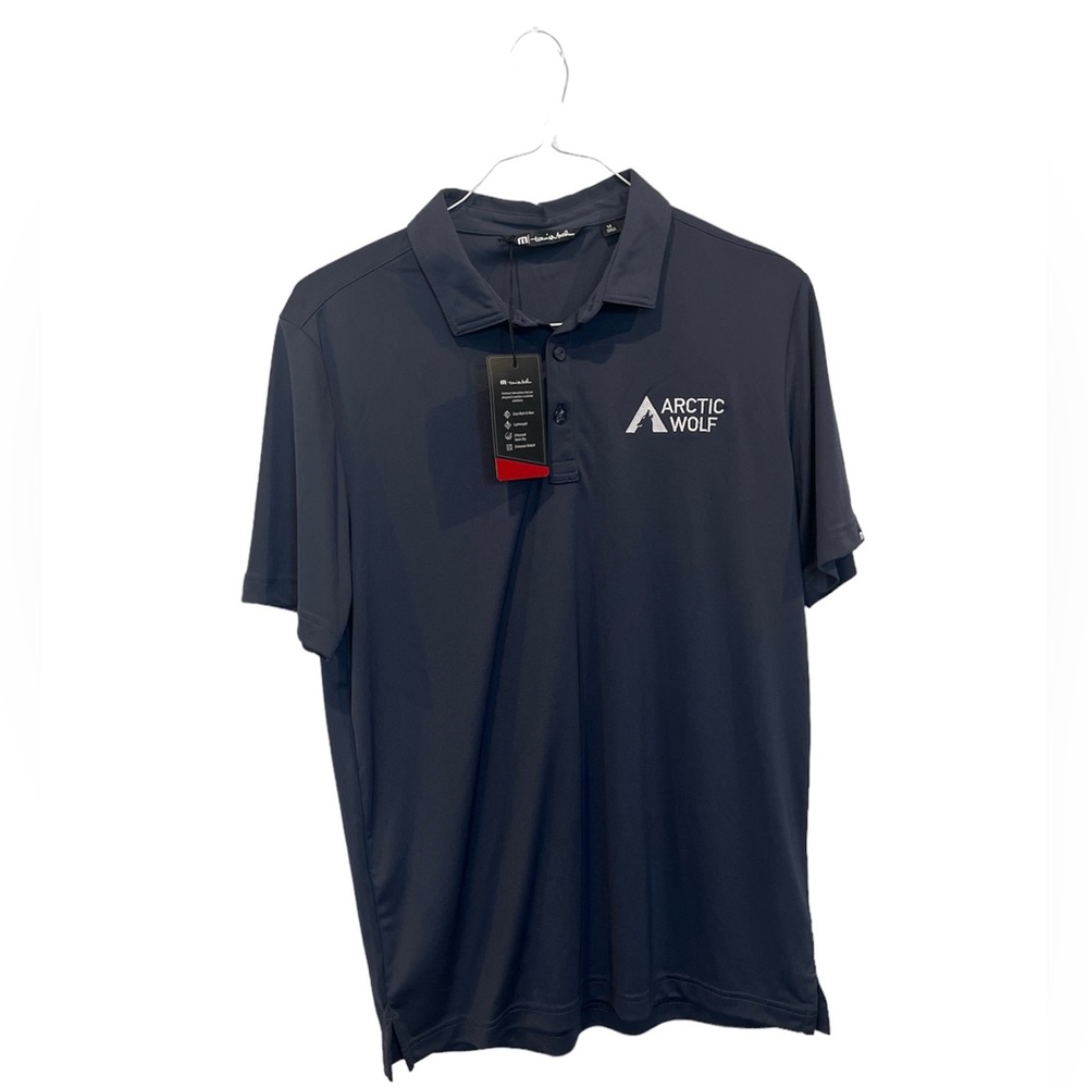 NEW Travis Mathew Polo Shirt Mens Size Medium Solid Blue Nights Arctic Wolf Logo